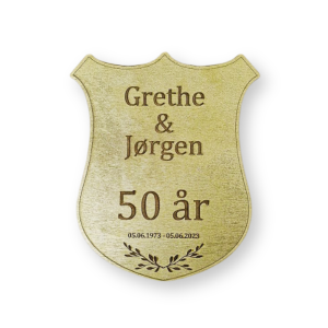 Skjold til æresport i guldmalet træ